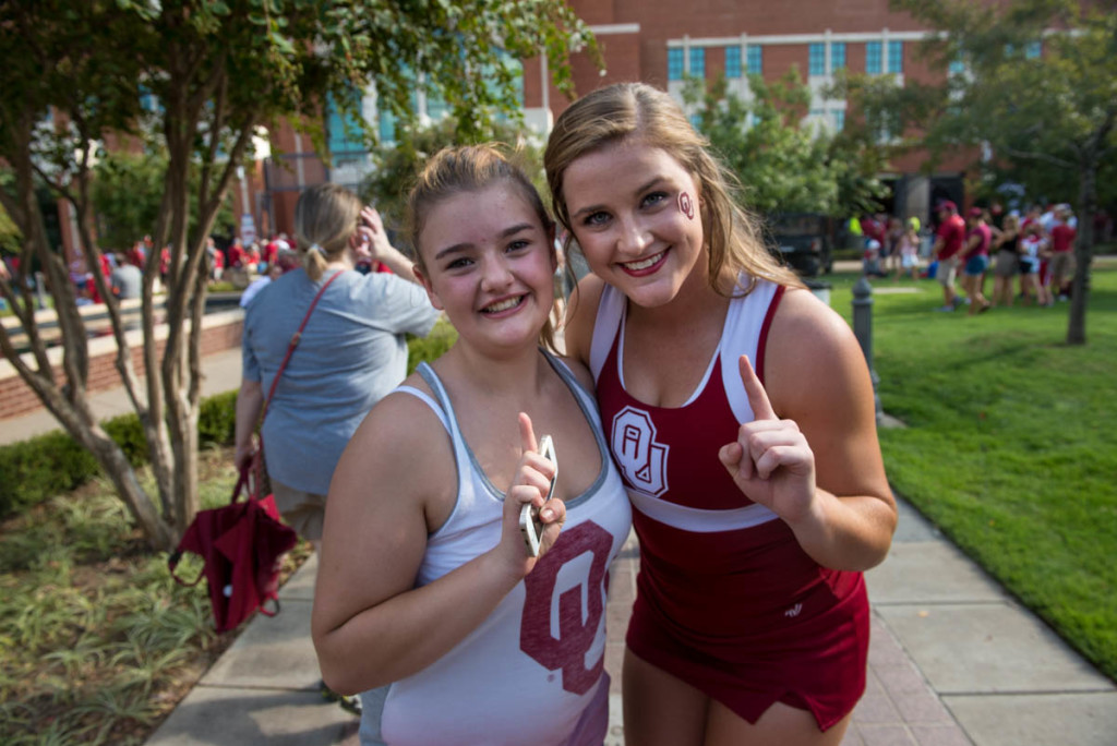 Hannah meets with her cousin OU Cheer Anna before the game.
