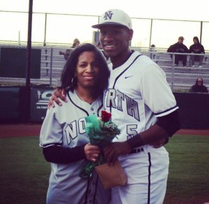 Nick with mom during his high school baseball days at Norman North.