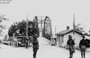 Sooner National Guardsmen keep the Red River Bridge open in 1931.